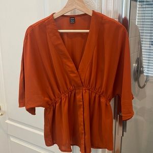 Burnt orange 70’s style shirt